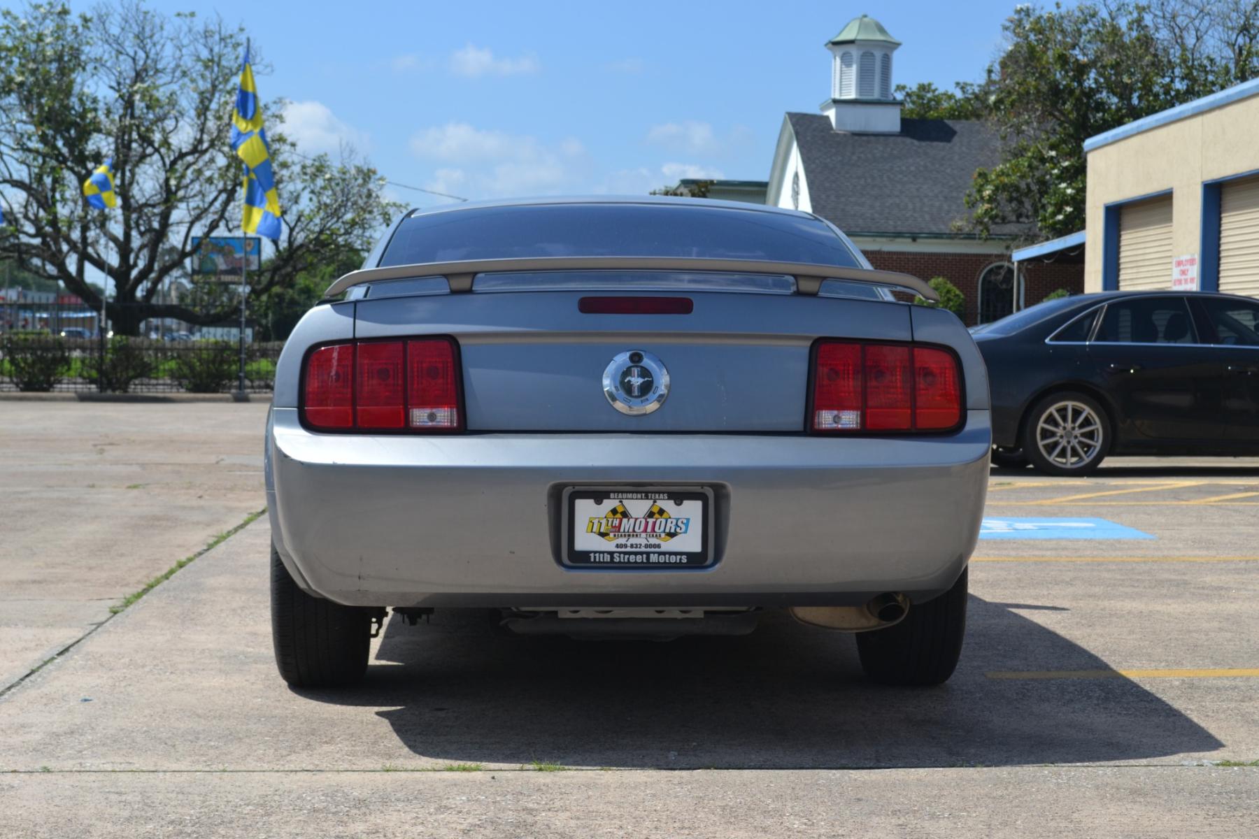 2006 Tungsten Grey Metall /Light Graphite Cloth Ford Mustang V6 Deluxe Coupe (1ZVFT80N665) with an 4.0L V6 SOHC 12V engine, located at 1355 North 11th Street, Beaumont, 77702, (409) 832-0006, 30.094290, -94.130096 - Photo #3